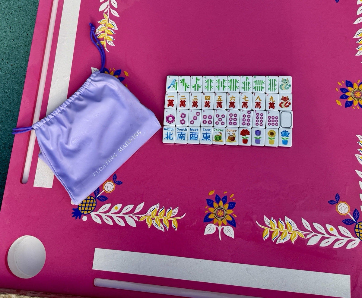Full Tide & Tile floating mahjong set of 160 tiles packed with travel bag and dice.