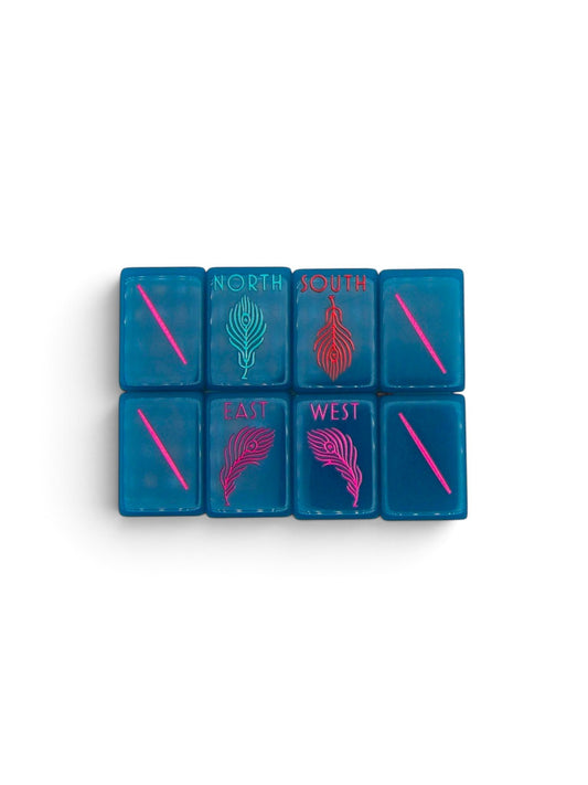 Luxury Mahjong Electric Bloom acrylic tiles featuring teal background with neon peacock feather wind designs