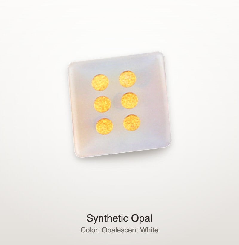 Luxury Mahjong 16mm synthetic opal die in milky white with a soft blue glow and bright gold pips