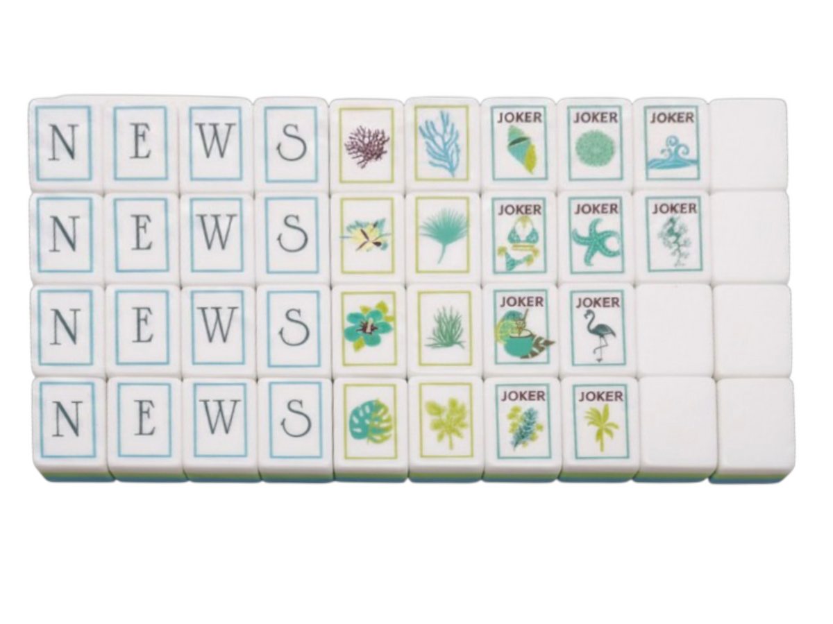 The Sea Glass Pearl American Mahjong tiles with hand-illustrated tropical botanicals in teal, sage and antique gold