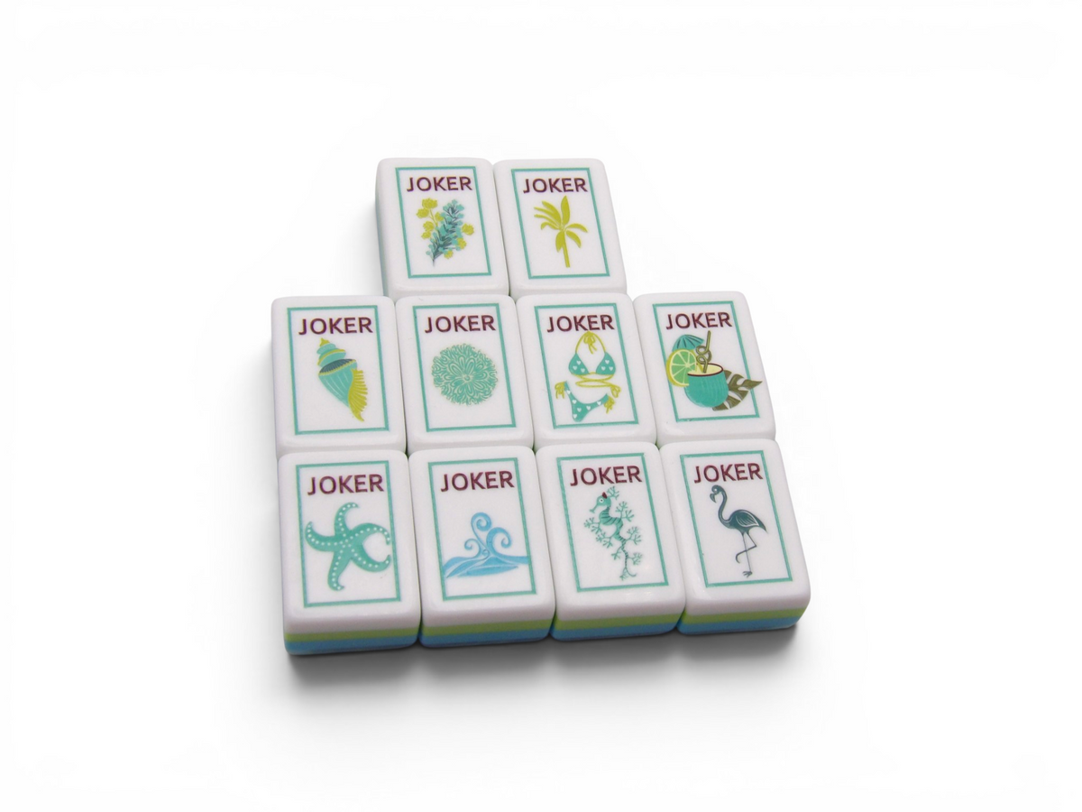 The Sea Glass Pearl American Mahjong Dot, Bam and Crack suit tiles with hand-illustrated coastal motifs
