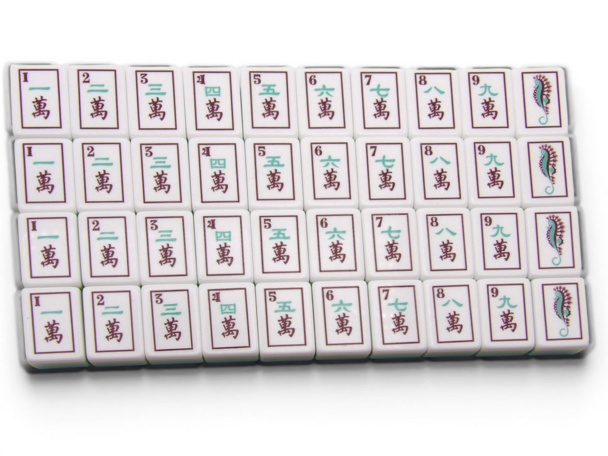 The Sea Glass Pearl American Mahjong Wind and Dragon suit tiles with hand-illustrated coastal motifs