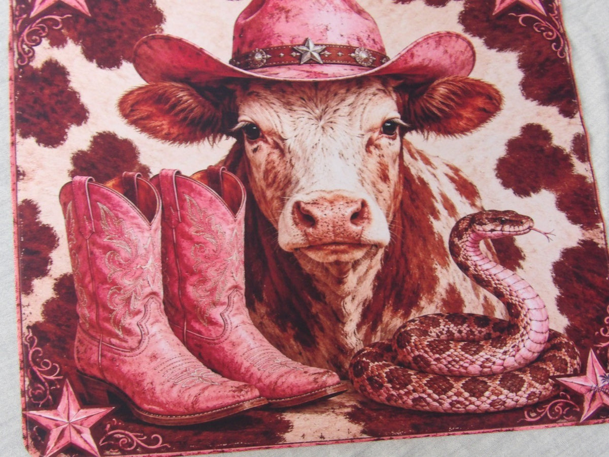 Close-up of the Rhinestone Rodeo mahjong mat showing the pink tooled boots, star corners and burgundy cowhide print
