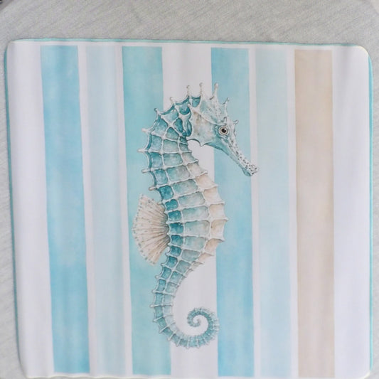 Aqua and white striped mahjong mat with a watercolor seahorse in the center and an aqua bound edge