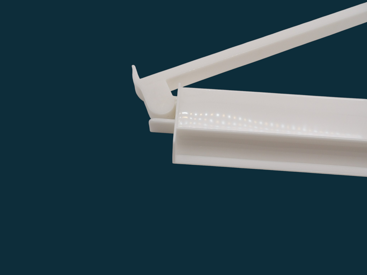 White acrylic mahjong rack side profile showing tile groove