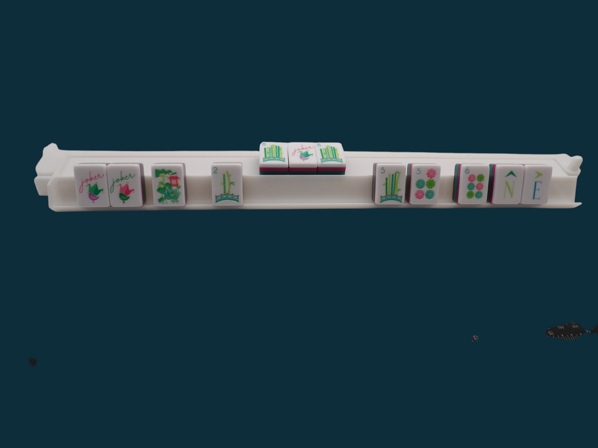 White acrylic mahjong rack set shown in packaging