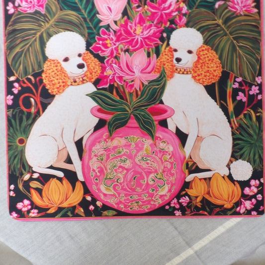 Close-up of the Poodle Parlor mahjong mat showing the apricot-eared poodles and the pink famille rose ginger jar