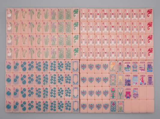The Paris Promenade American Mahjong set — complete 160-tile collection in peachy-pink acrylic with bag, gift box and agate dice.