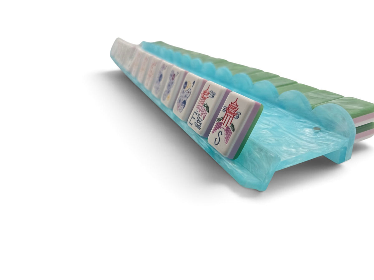 Aqua pearl scalloped mahjong racks arranged on a game table