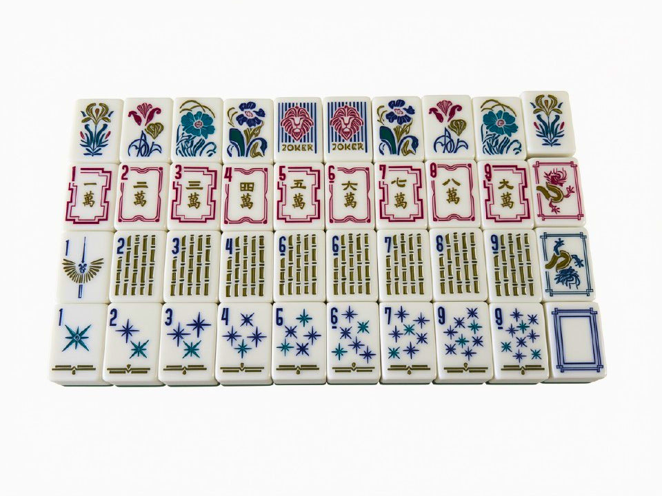 The Deco Lion Art Deco mahjong tile set laid out in full.