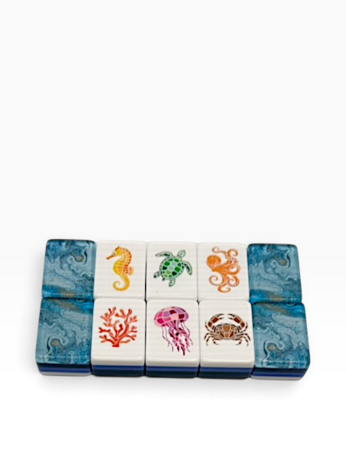 Luxury Mahjong Anchor & Tide set tiles featuring colorful sea life illustrations on white acrylic with navy backs.