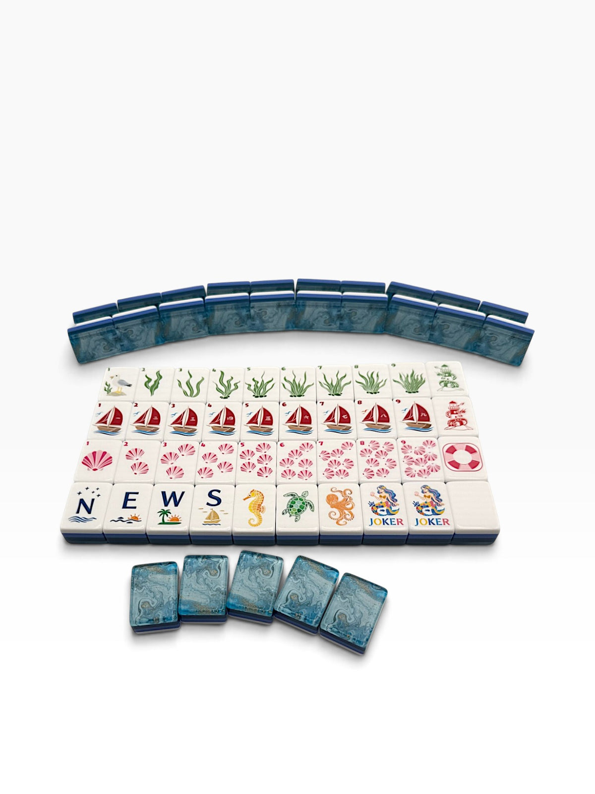 Luxury Mahjong Anchor & Tide set with white acrylic tiles featuring coastal illustrations and navy marbled backs.