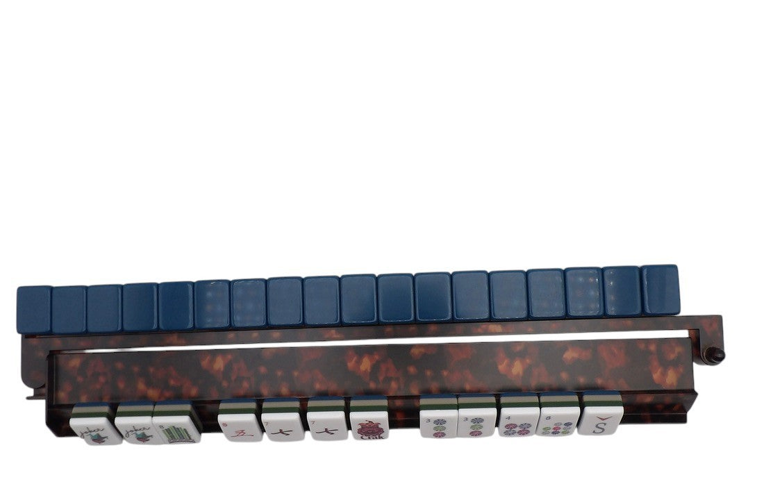 Luxury Mahjong Blue Willow set featuring navy acrylic tiles on a tortoiseshell rack for American Mahjong play