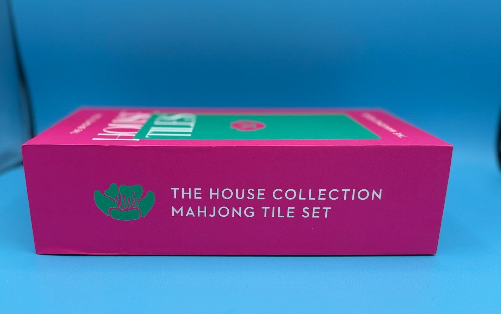 Luxury Mahjong The Brights! Teal House Tiles set in a vibrant pink box with a green floral logo.