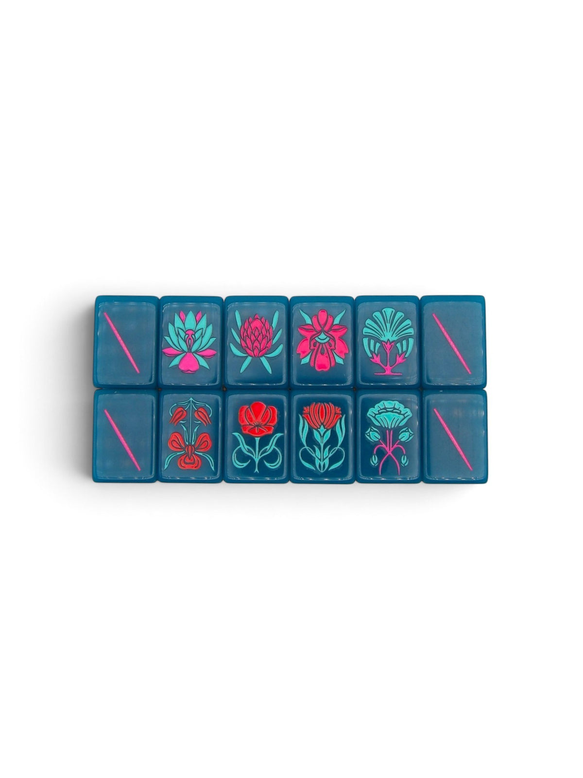 Luxury Mahjong Electric Bloom acrylic tiles in deep teal with vibrant hot pink and turquoise botanical illustrations.