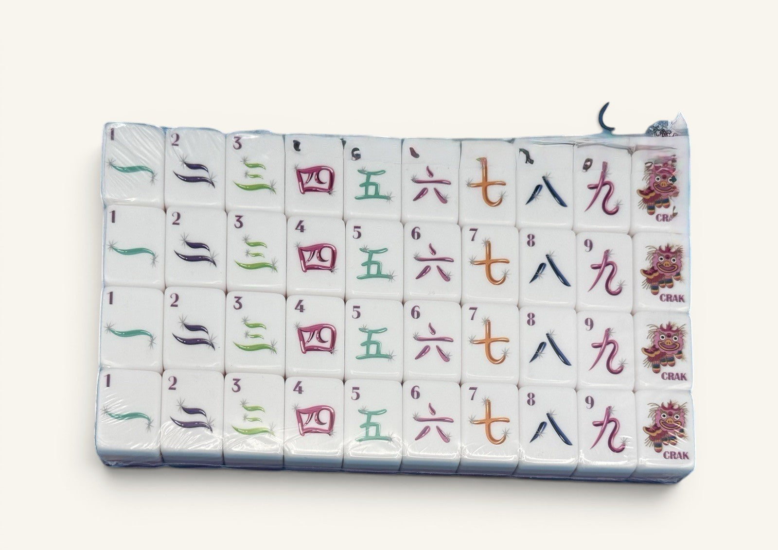 Luxury Mahjong glitter pink American Mahjong tiles with whimsical colorful designs and dragon Joker characters