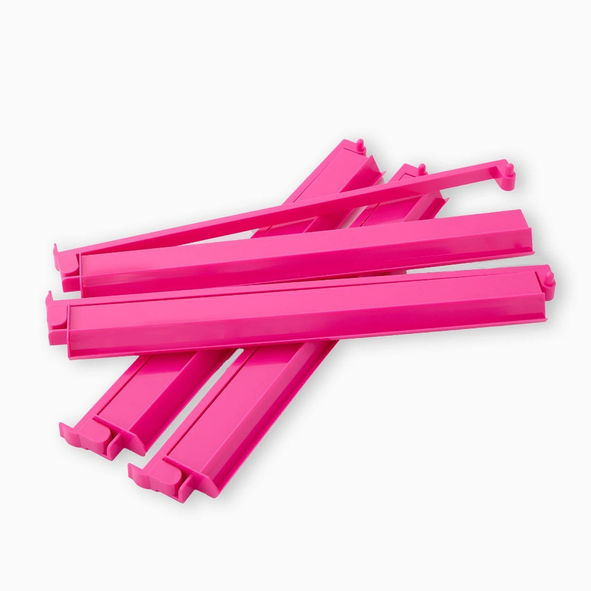 Luxury Mahjong set of four 18.5-inch hot pink glossy acrylic racks with attached hinged pushers.