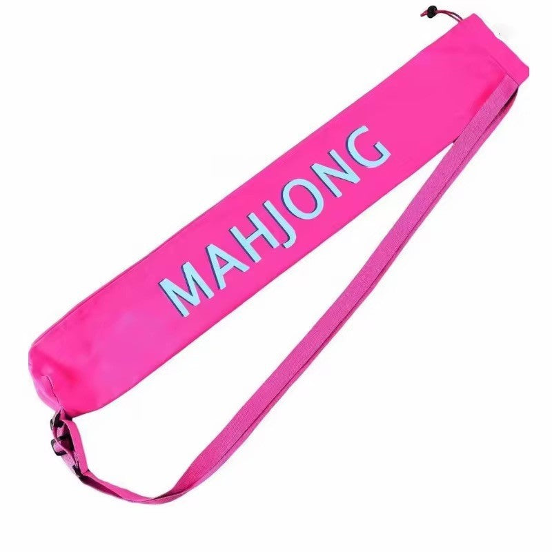 Luxury Mahjong hot pink canvas mat bag with light blue MAHJONG lettering, drawstring closure, and adjustable strap.