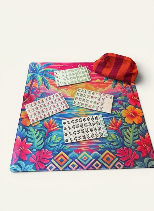 Luxury Mahjong Mai Tai Sunset set featuring a tropical neoprene mat, acrylic tiles, and a striped orange tile bag.