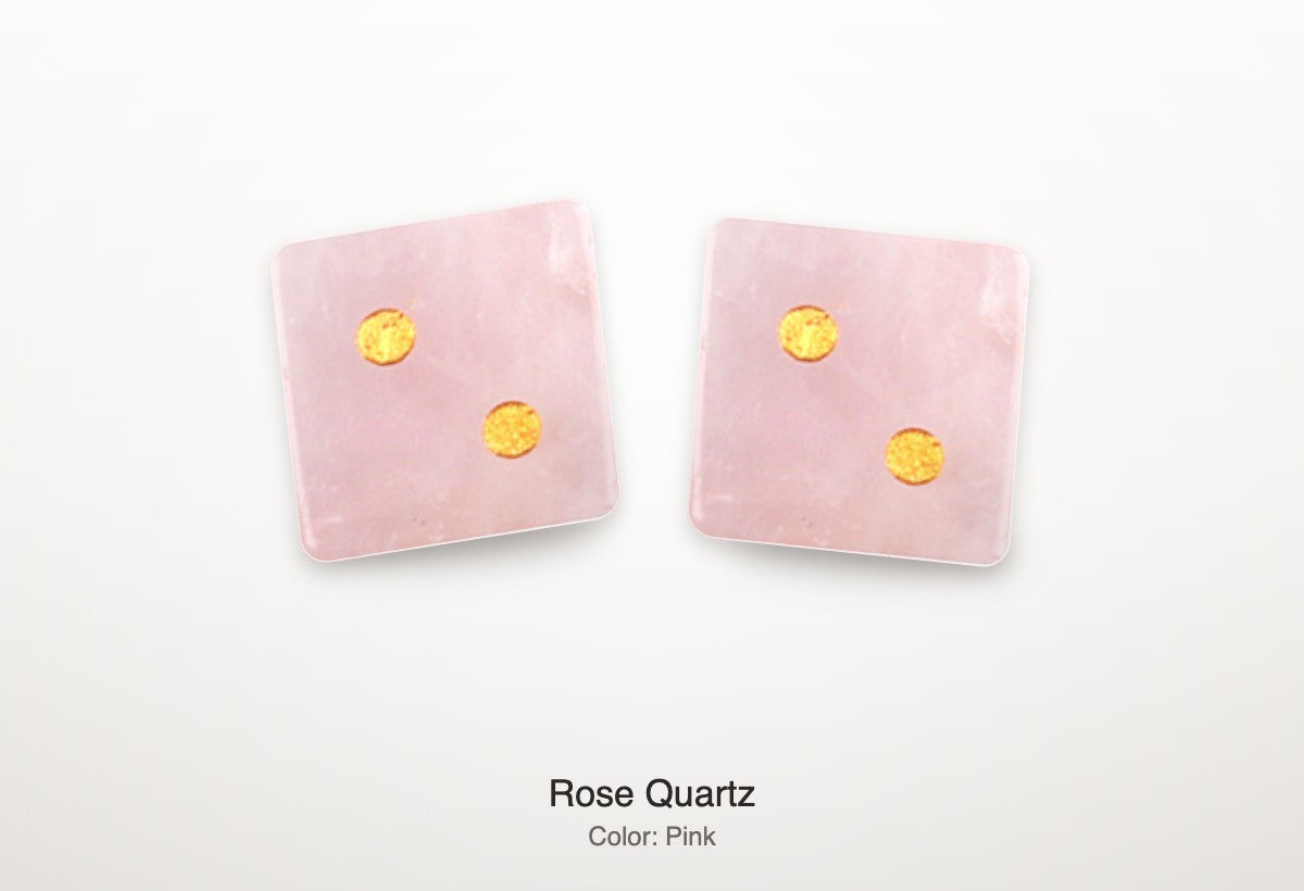 Luxury Mahjong pair of 16mm rose quartz dice featuring blush-pink stone with natural veining and bright gold pips.