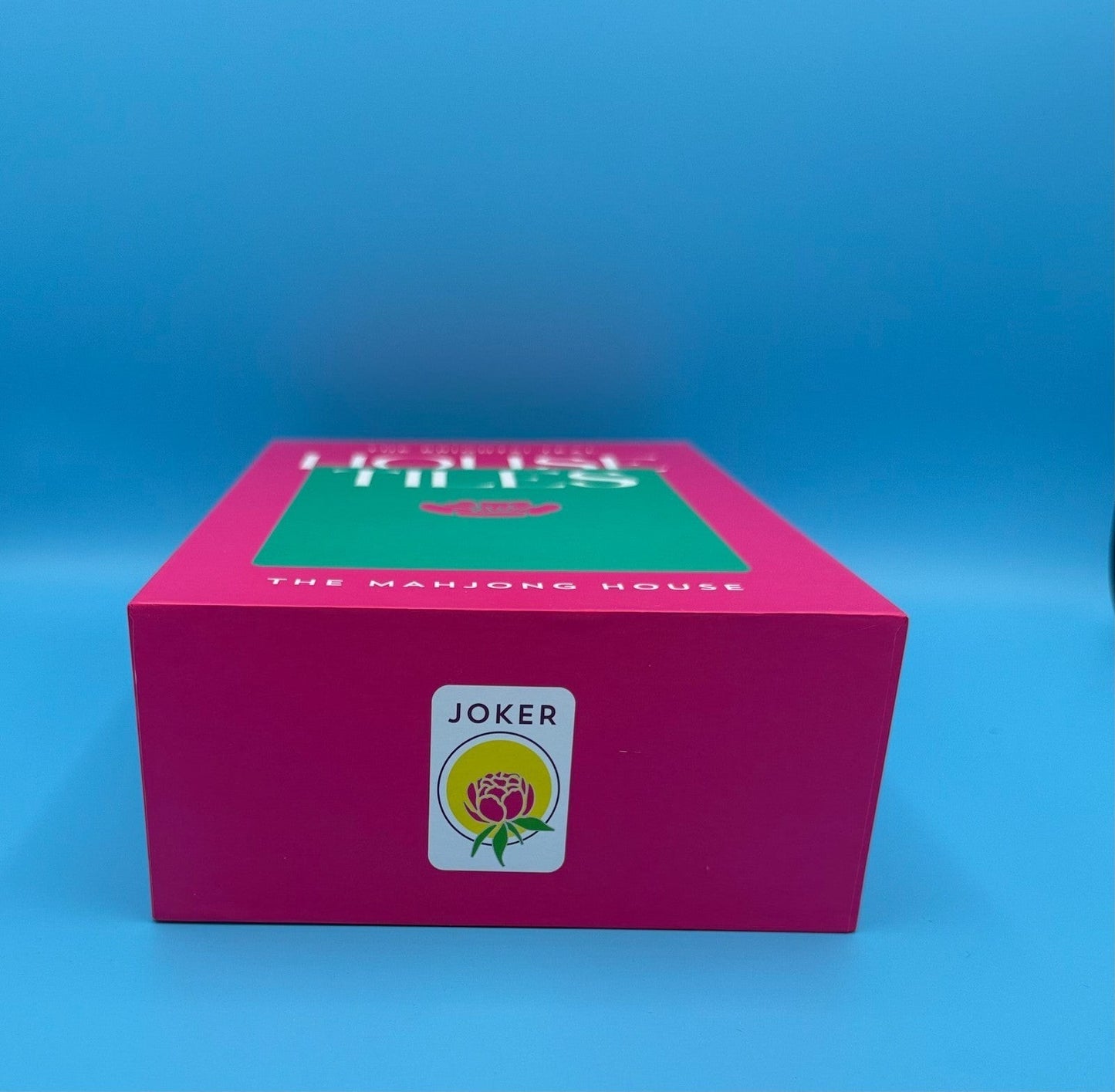 Luxury Mahjong The Brights! Teal House Tiles set in a vibrant pink box with a floral Joker tile label.