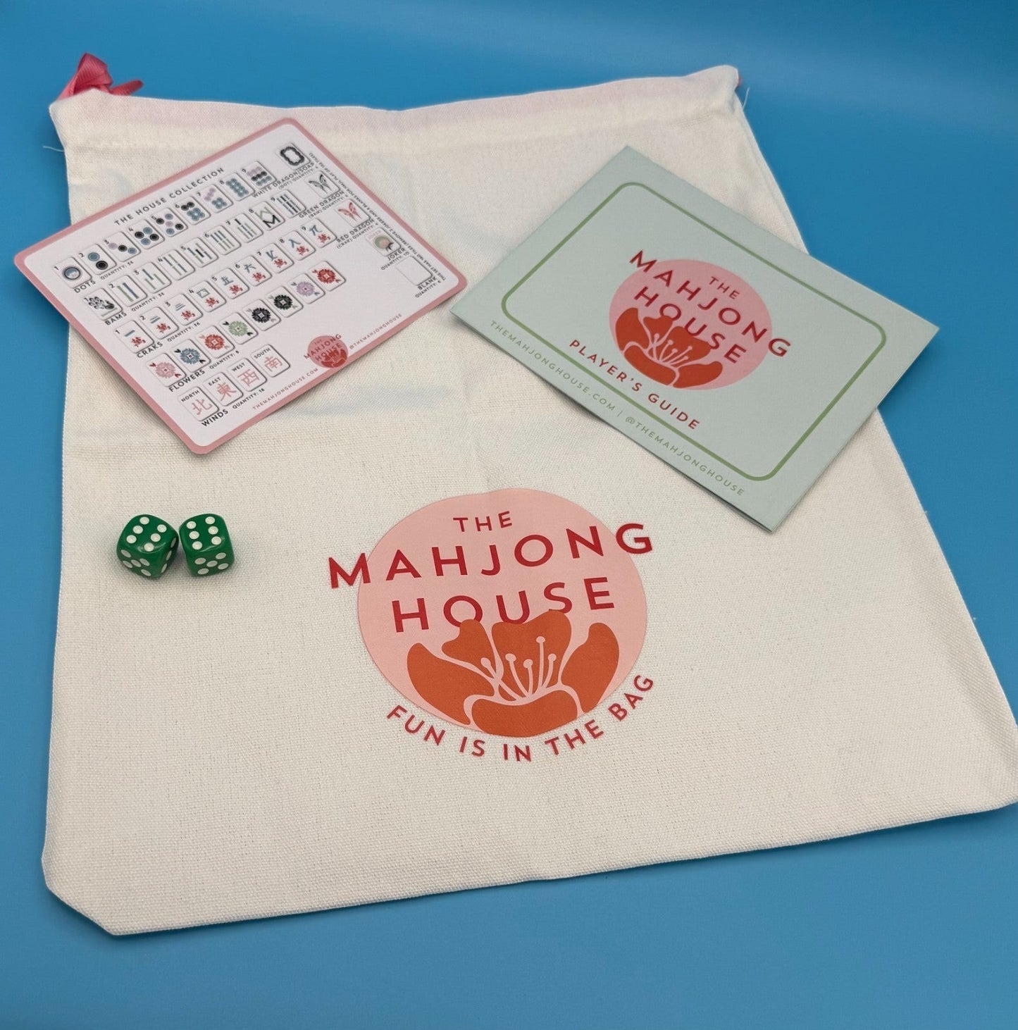 Luxury Mahjong The Mahjong House The Brights! Teal House Tiles set with canvas storage bag, dice, and player guide.