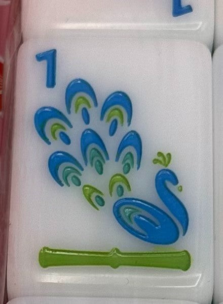Luxury Mahjong The Brights! teal peacock design mahjong tile with white background and green bamboo detail
