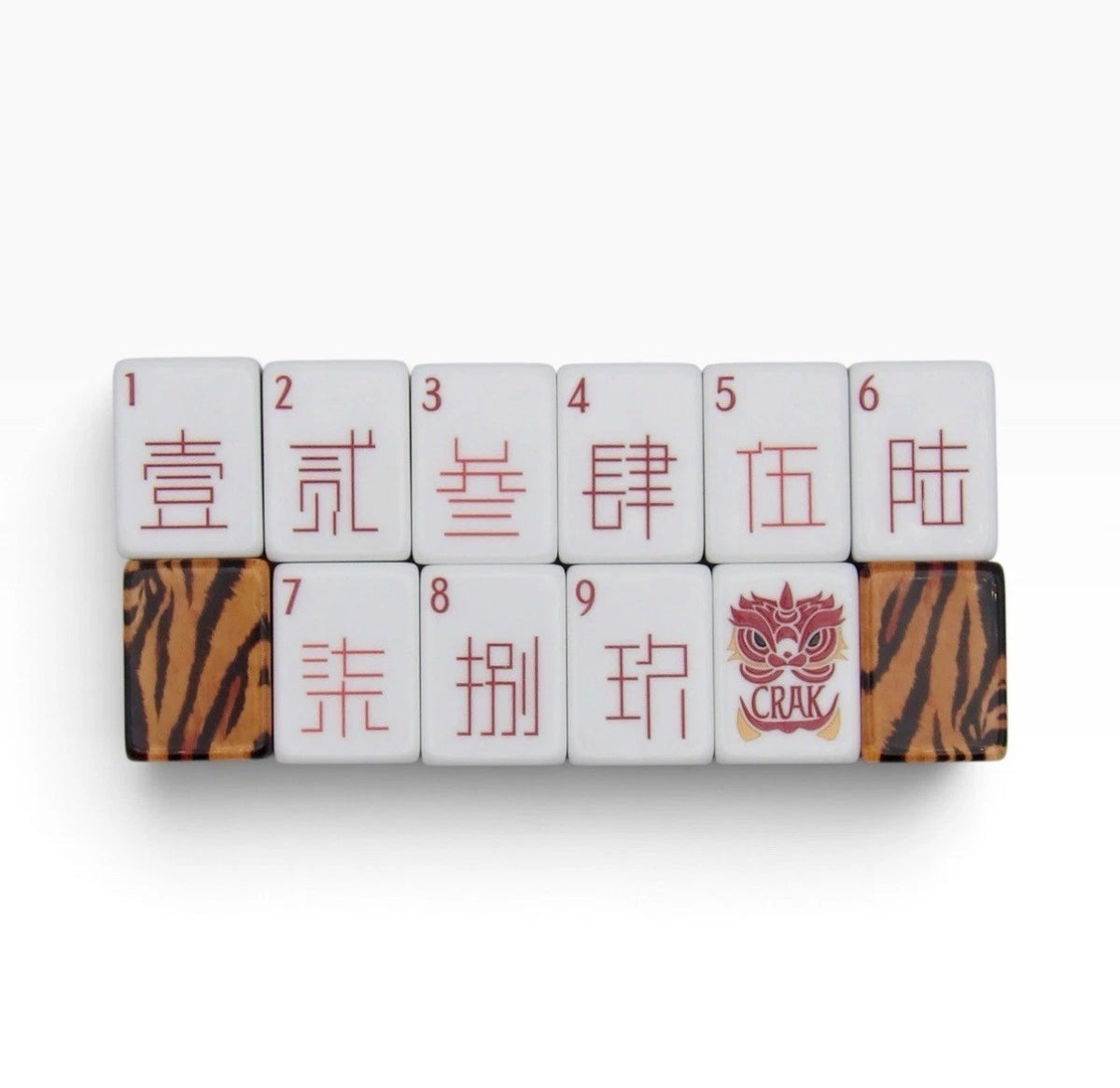 Luxury Mahjong Tiger Lily acrylic tiles featuring red Chinese numerals and a dragon mask design on a white background
