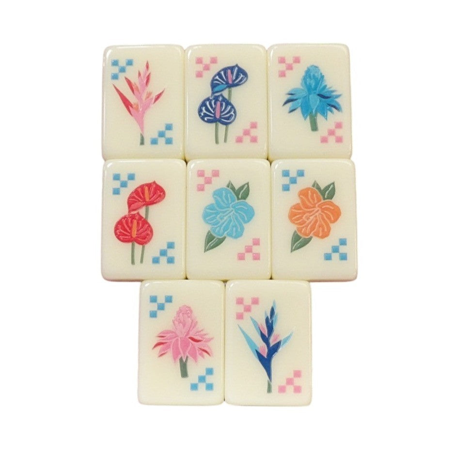 Luxury Mahjong tropical themed tiles featuring colorful exotic flower illustrations on a smooth cream background