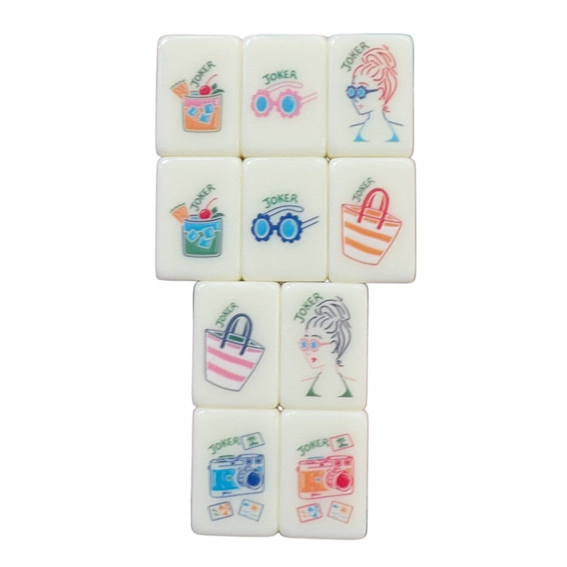 Luxury Mahjong tropical vacation themed tiles featuring colorful illustrations of cocktails, sunglasses, and cameras.