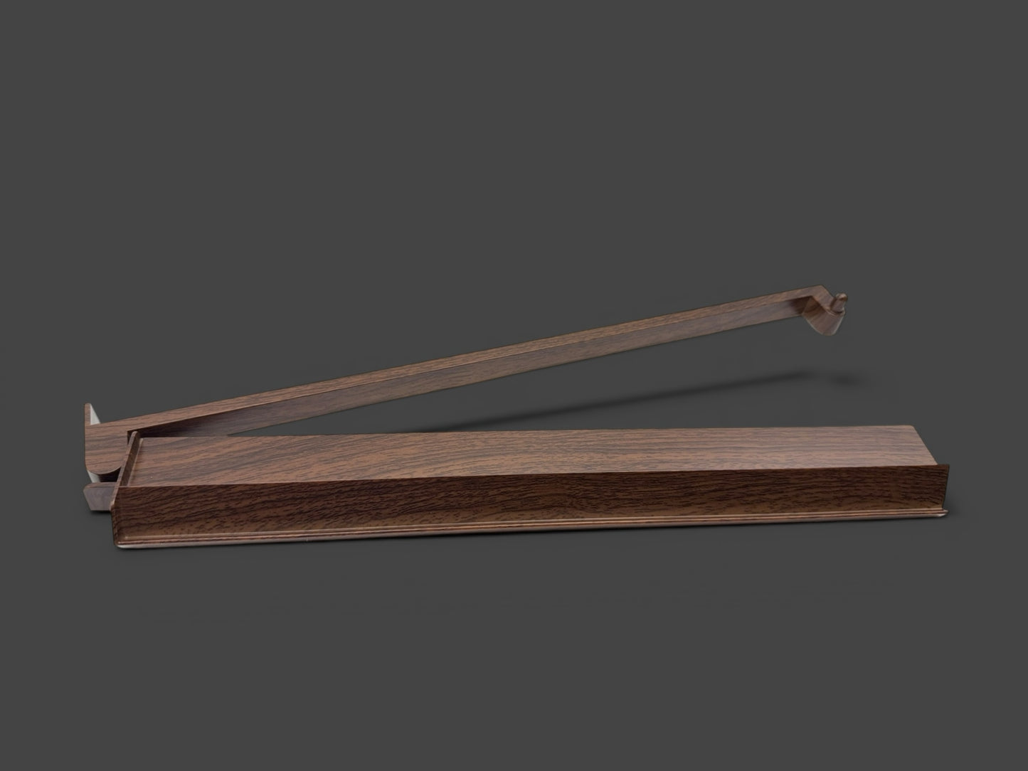 Luxury Mahjong dark wood tile rack with smooth finish and angled design for tile visibility.
