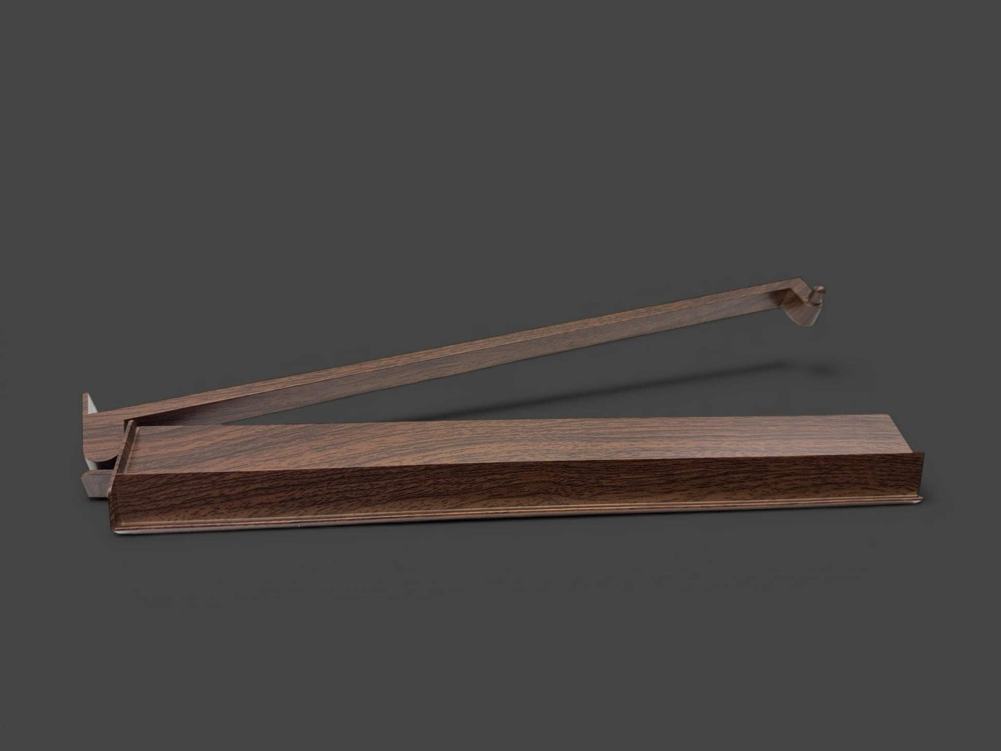 Luxury Mahjong dark wood tile rack with smooth finish and angled design for tile visibility.