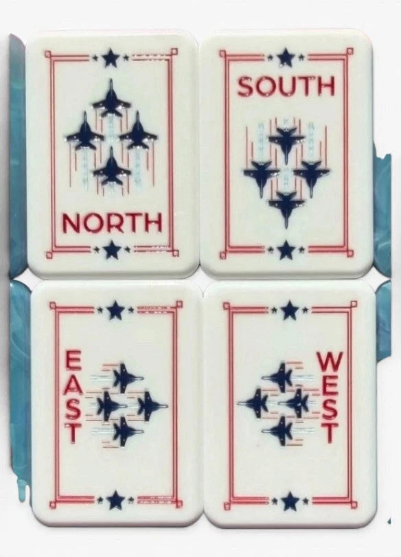 Red White & Bam patriotic fireworks mahjong tile artwork — red and navy palette close-up, detail 4